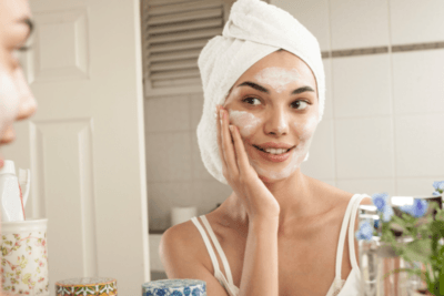 A teen practicing one of the 7 healthy habits for teenagers: skincare
